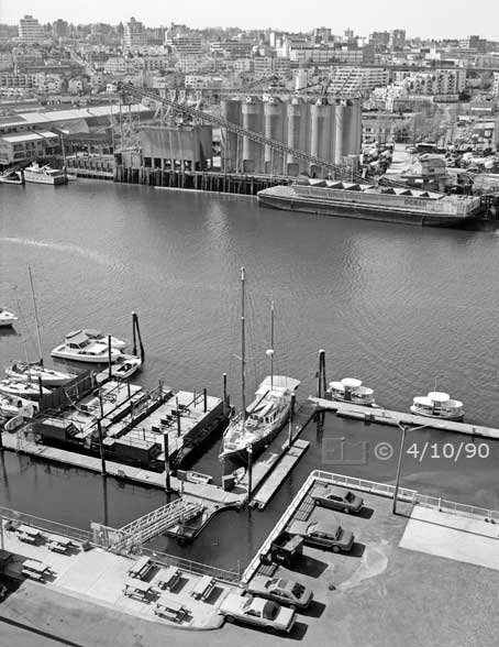 B/W photo: Elevated view of waterway and both shores from Granville Bridge - Embedded text: 4/10/90