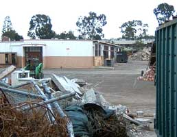 Color photo:  View from north of remaining old West City Center building 