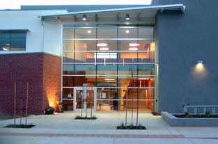 Color photo: East entrance of new West City Campus building